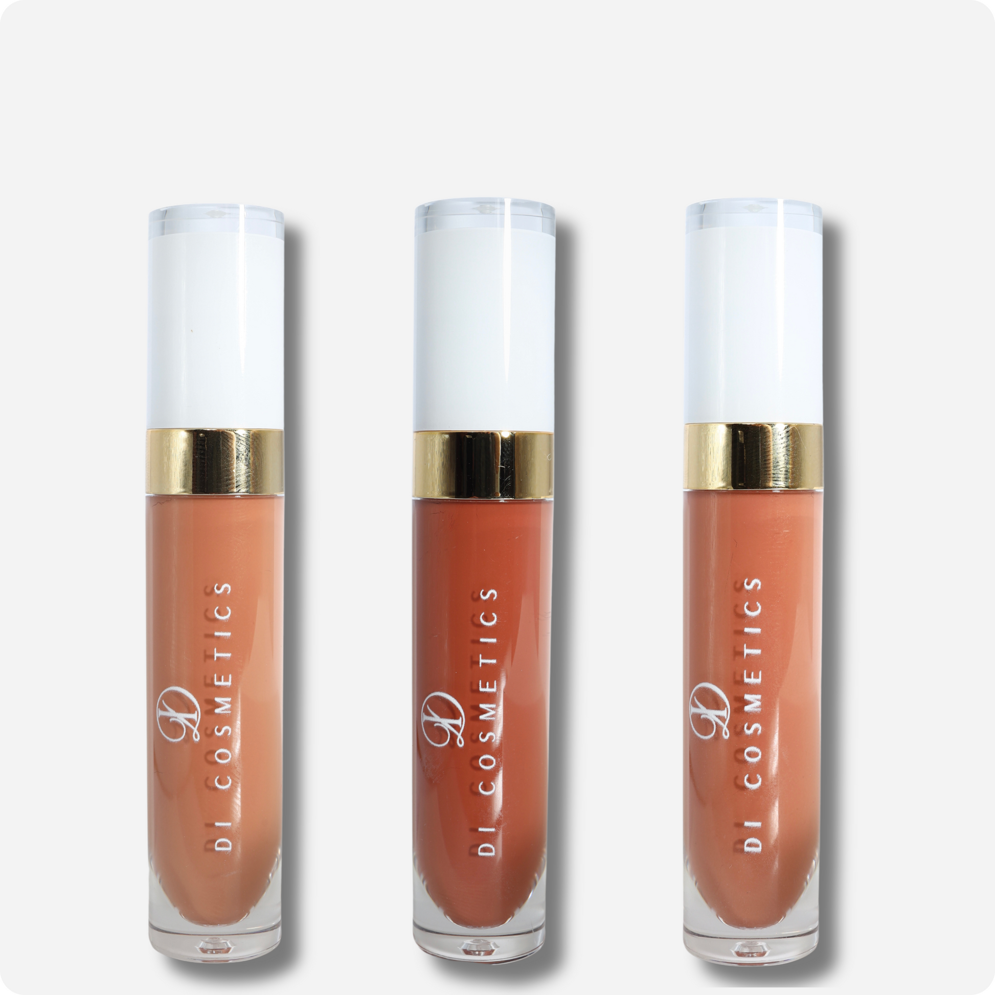 <img src="lipstick-bundle.jpg" alt="Set aus drei flüssigen Lippenstiften in den Farben Biscuit Nude, Coconut Nude und Lotus Nude">